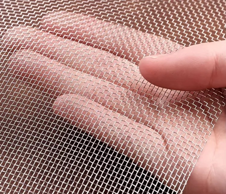 Fine stainless steel wire mesh held in hand